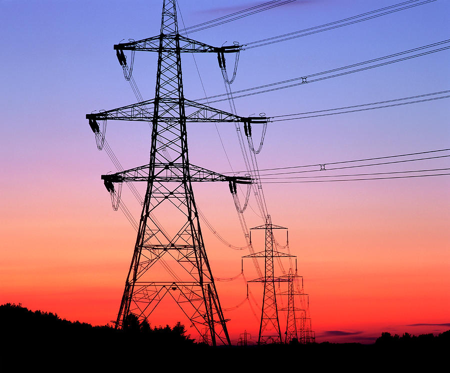 electricity-pylons--transmission-lines-at-sunset-martin-bondscience-photo-library.jpg